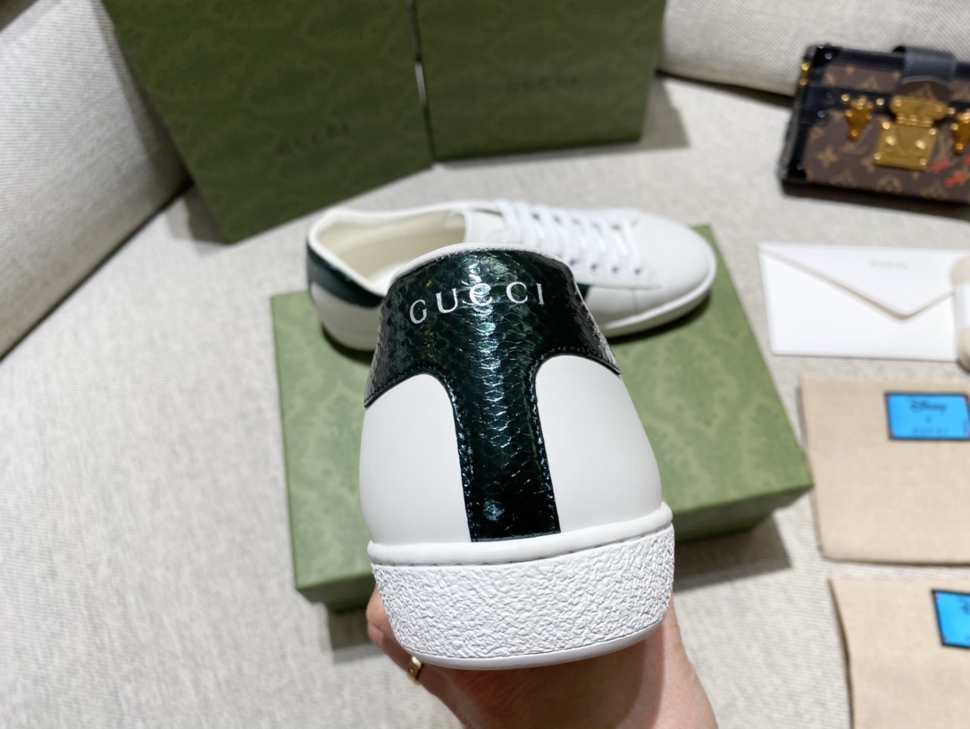 G*u*i sneakers