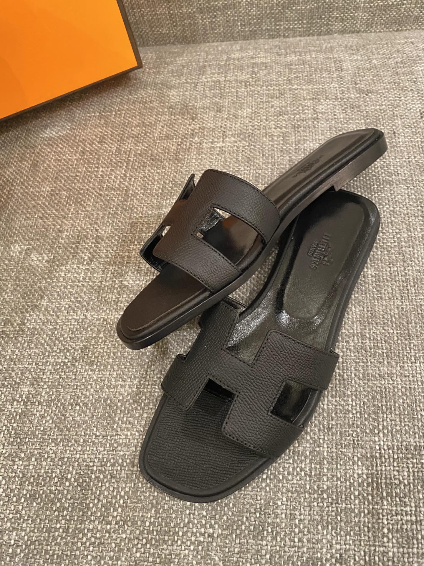 H**mes slippers in caviar leather