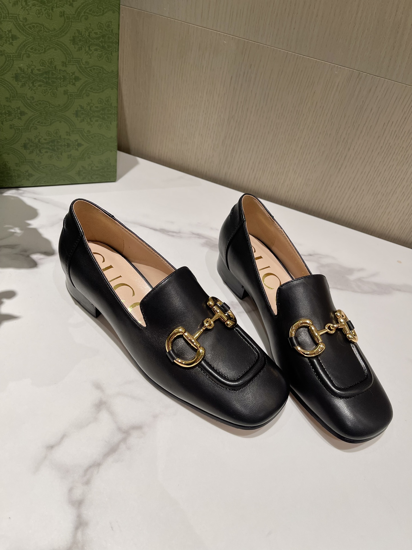 G*u*i loafers
