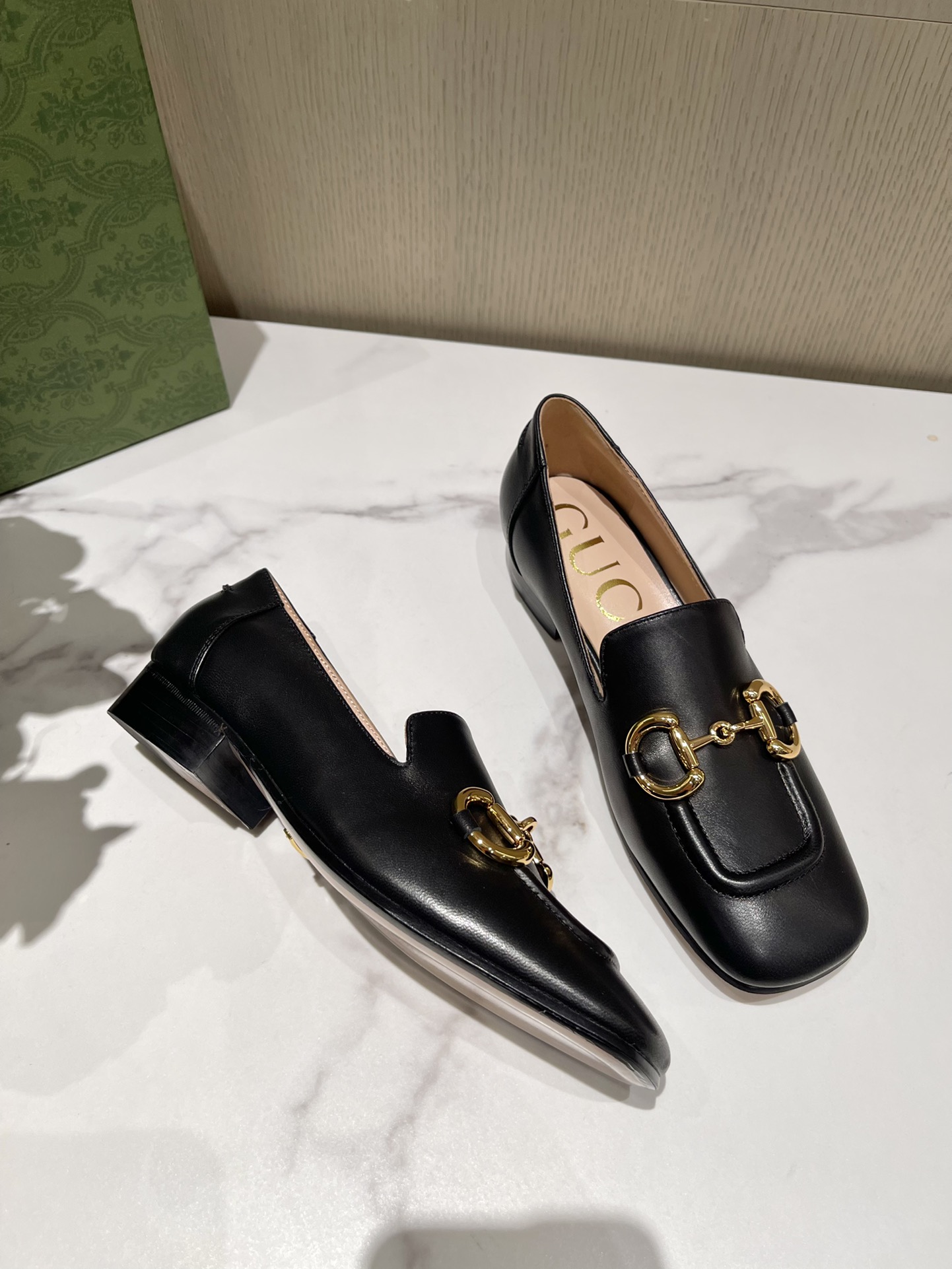 G*u*i loafers