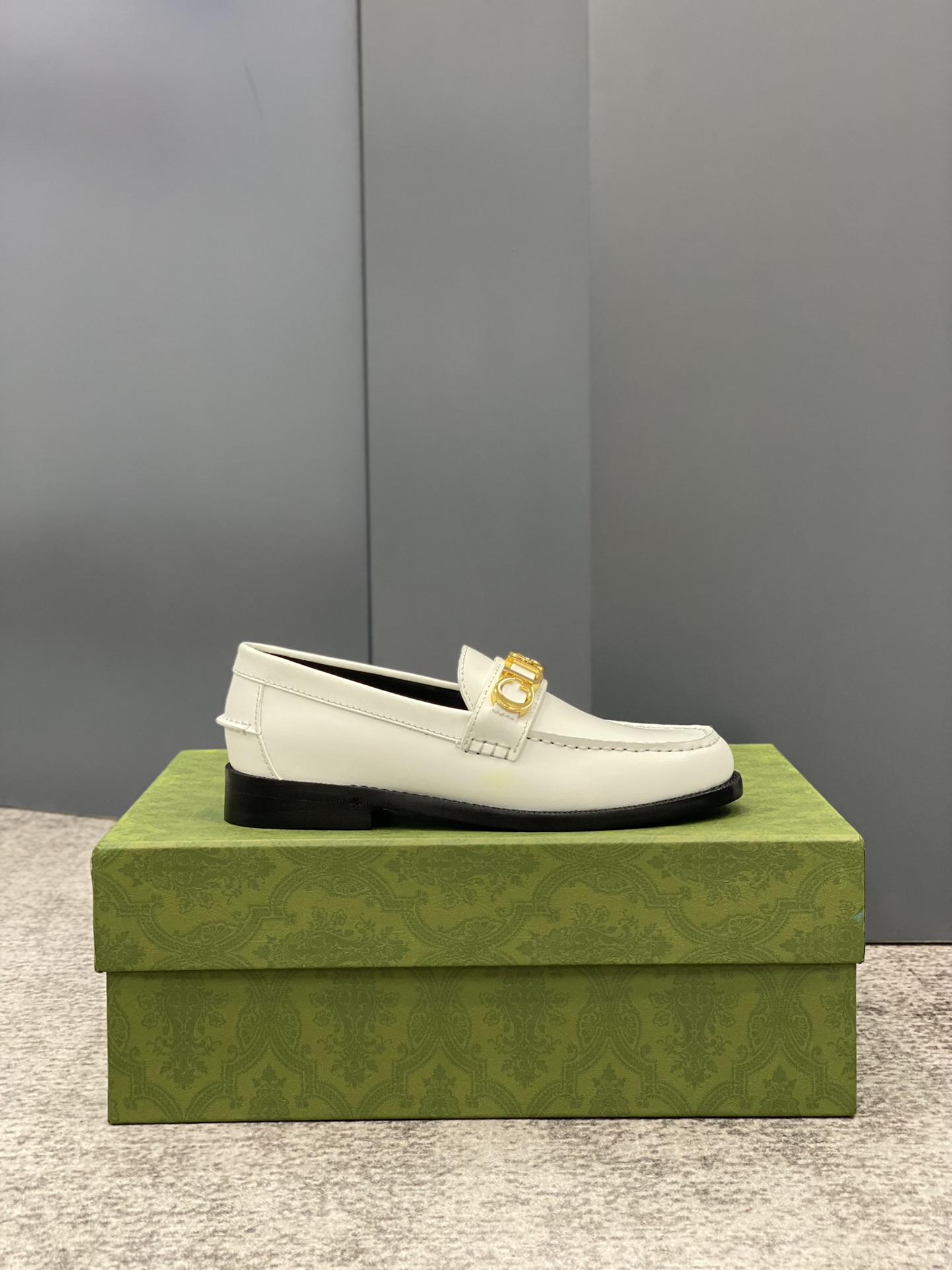 G*u*i loafers
