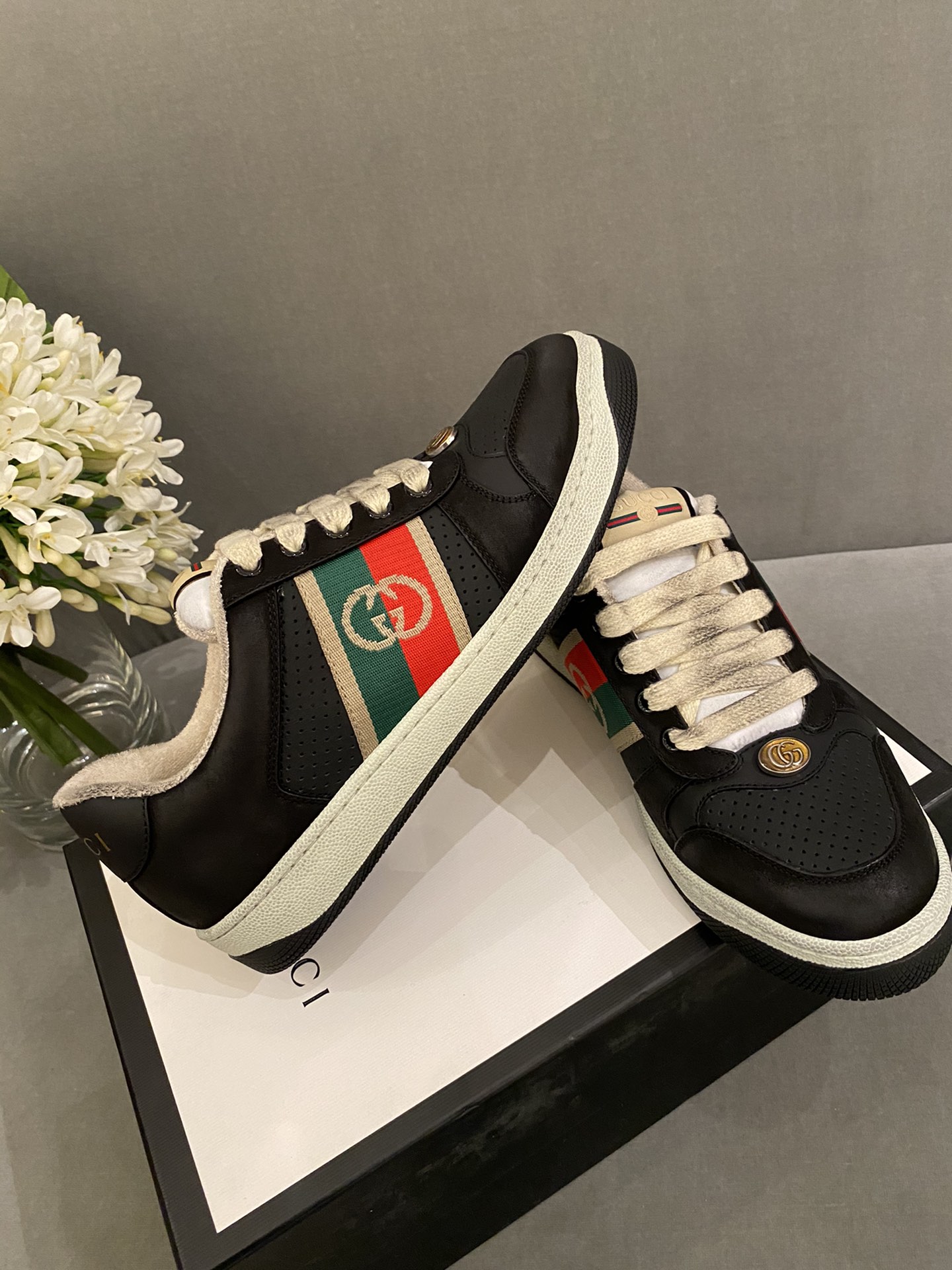 G*u*i sneakers