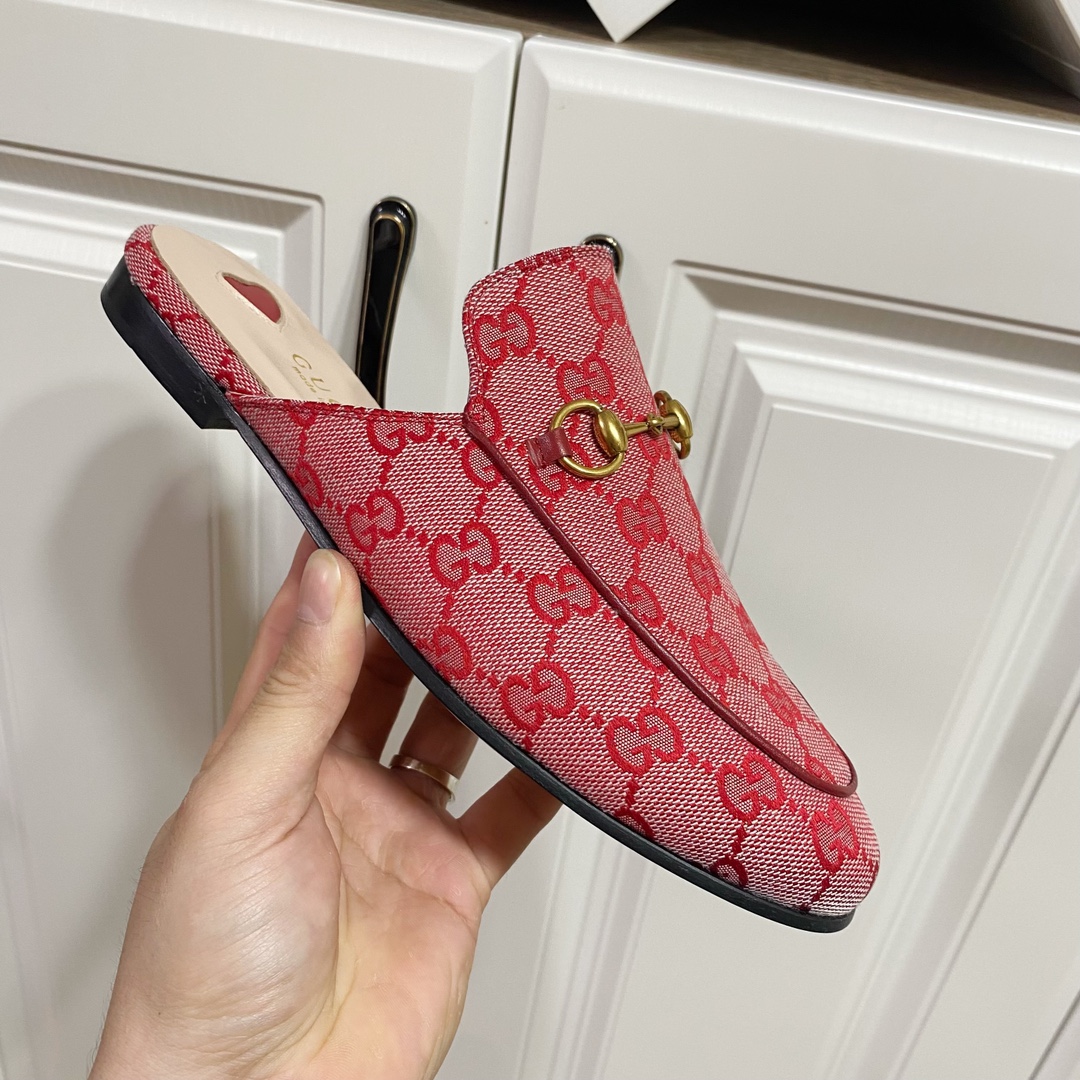 G*u*i loafers