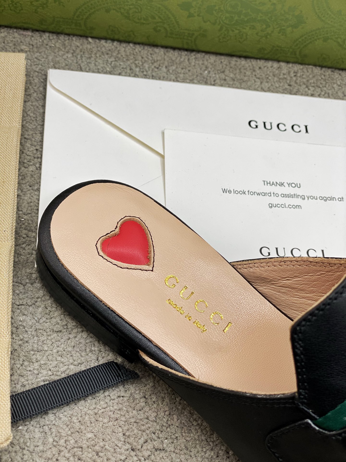 G*u*i loafers