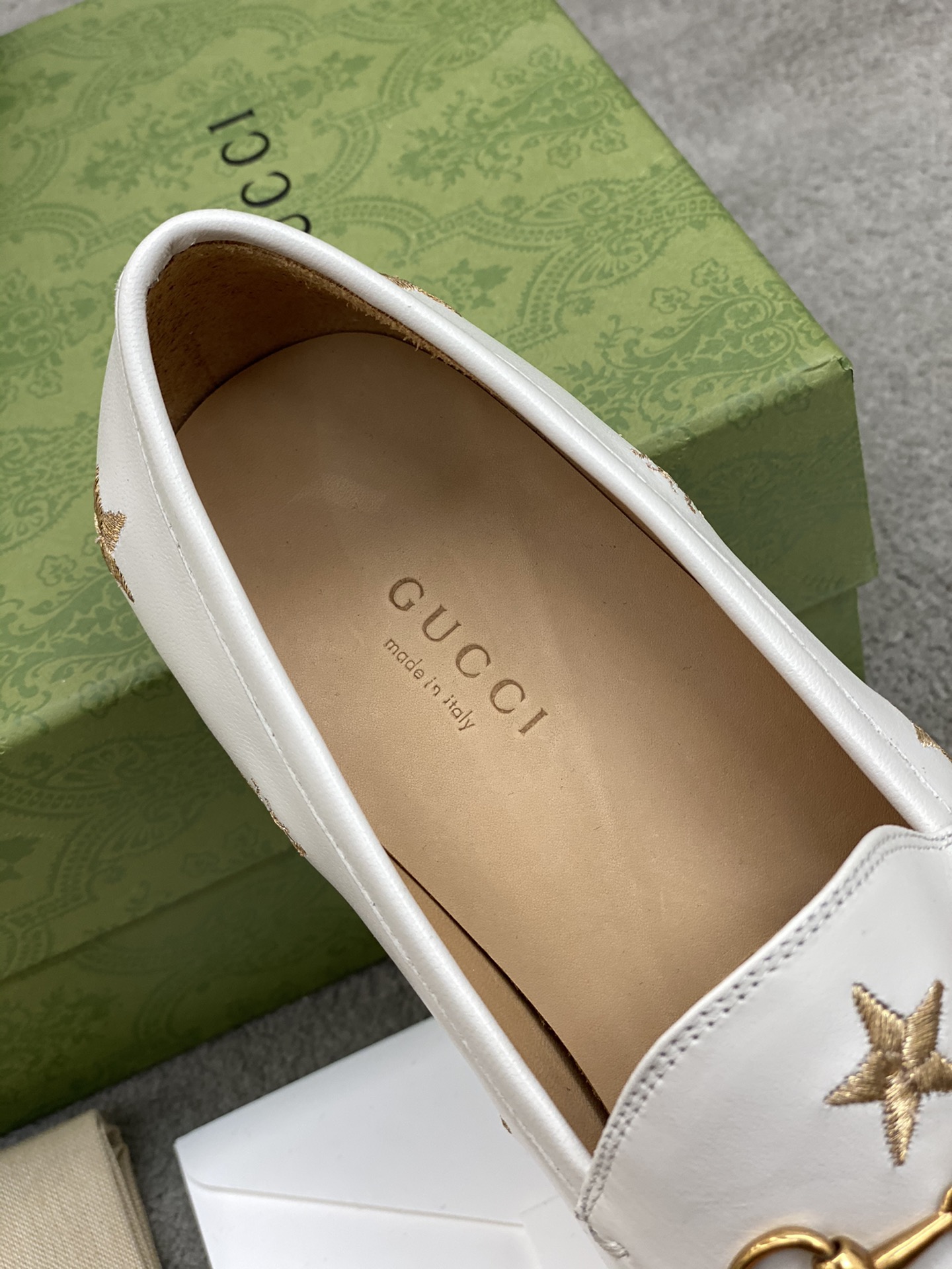 G*u*i loafers